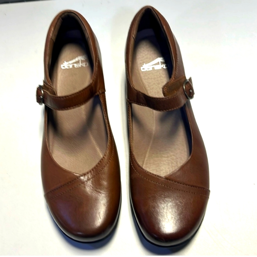 DANSKO brown Mary Jane’s never worn but a few scratches on leather please look